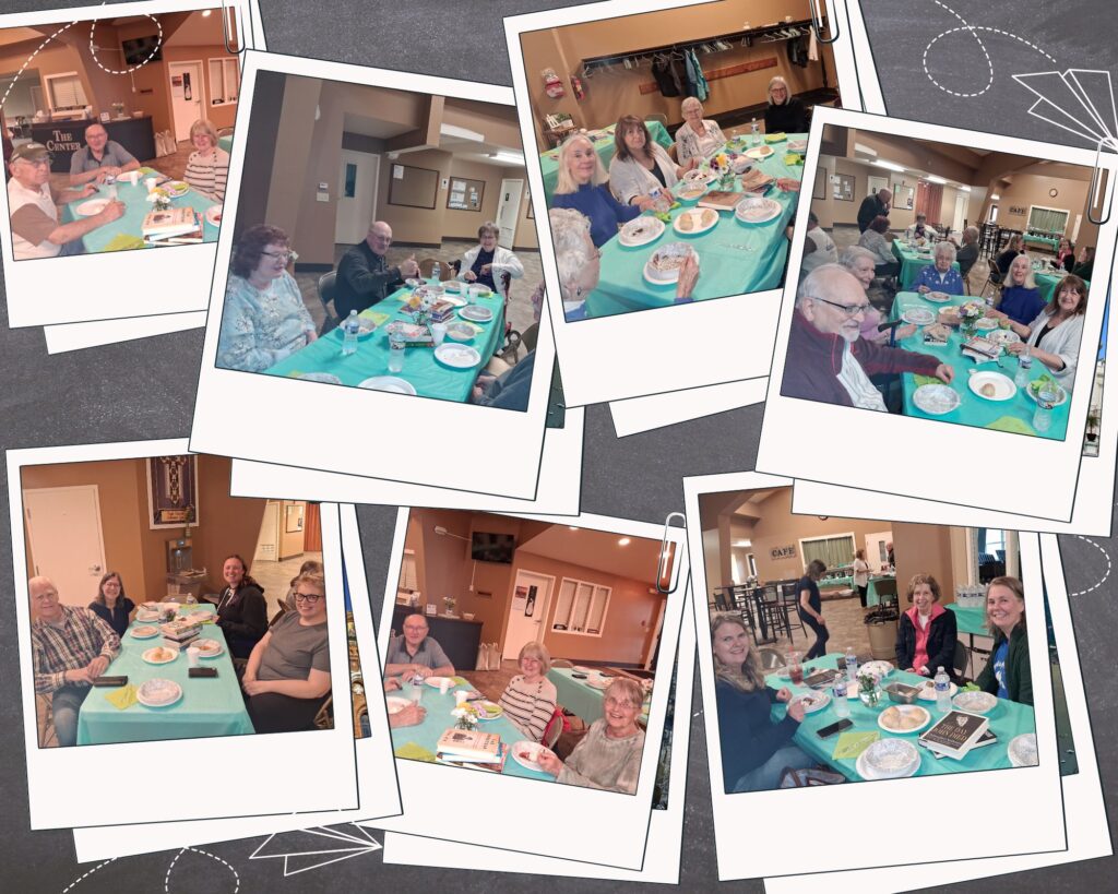 A collage of Polaroid‑style photos shows community members seated at turquoise‑covered tables, sharing a meal and talking in a warm indoor gathering space. Plates, cups, and food are visible on the tables, with beige walls and café signage in the background, conveying a friendly, social event.